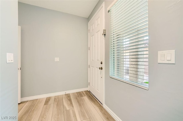 5990 Viscaya Grove St, Las Vegas, NV 89118 - doorway with light wood-type flooring and baseboards