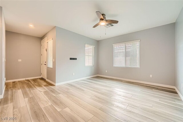 5990 Viscaya Grove St, Las Vegas, NV 89118 - unfurnished room with ceiling fan and light wood finished floors