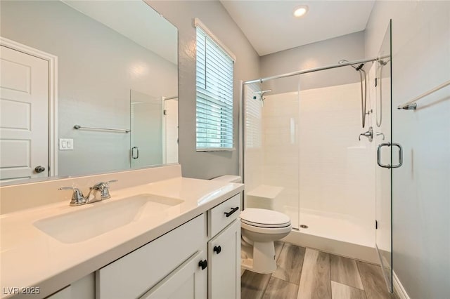 5990 Viscaya Grove St, Las Vegas, NV 89118 - full bath featuring wood finished floors, a stall shower, and vanity