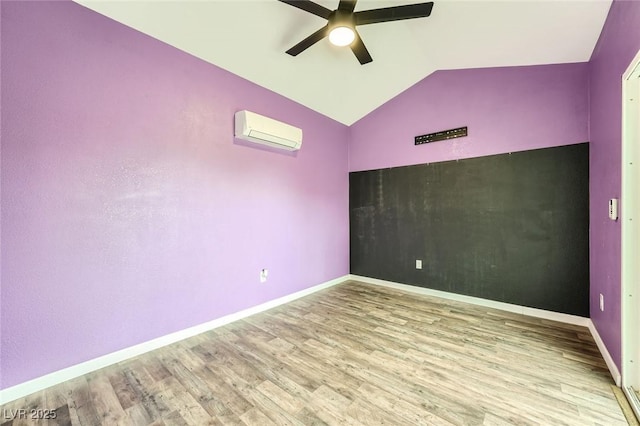 5990 Viscaya Grove St, Las Vegas, NV 89118 - unfurnished room with an AC wall unit, a ceiling fan, wood finished floors, and lofted ceiling