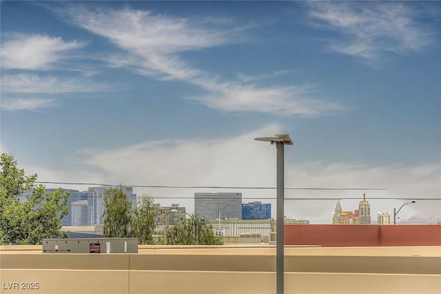 5990 Viscaya Grove St, Las Vegas, NV 89118 - view of tennis court with a view of city