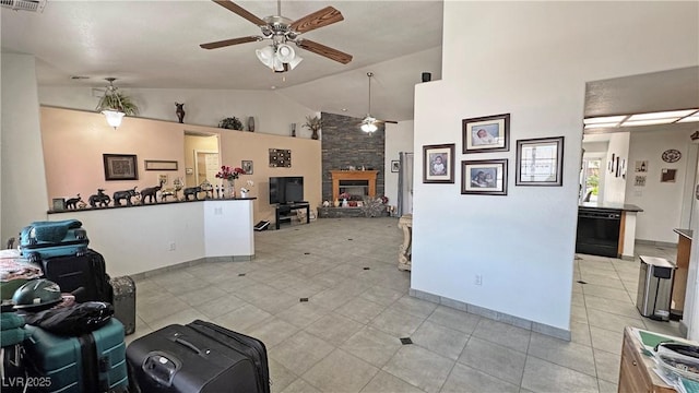 4910 Marywood Ct, Pahrump, NV 89061 - living area with a ceiling fan, high vaulted ceiling, a fireplace, and light tile patterned floors