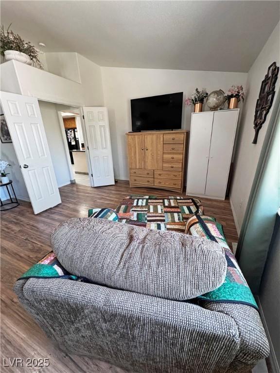 4910 Marywood Ct, Pahrump, NV 89061 - living area featuring wood finished floors and baseboards