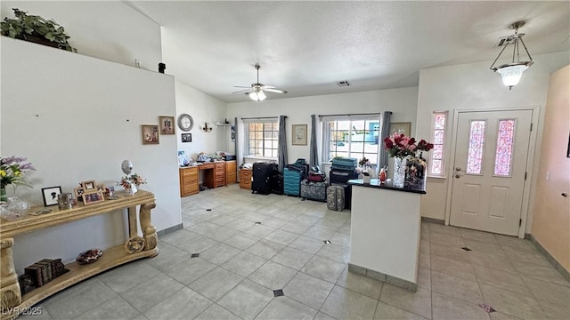 4910 Marywood Ct, Pahrump, NV 89061 - entrance foyer featuring a ceiling fan and light tile patterned flooring