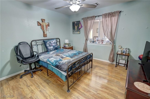 4910 Marywood Ct, Pahrump, NV 89061 - bedroom featuring light wood-type flooring and a ceiling fan