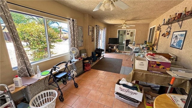 4910 Marywood Ct, Pahrump, NV 89061 - misc room featuring tile patterned flooring, ceiling fan, and a textured ceiling