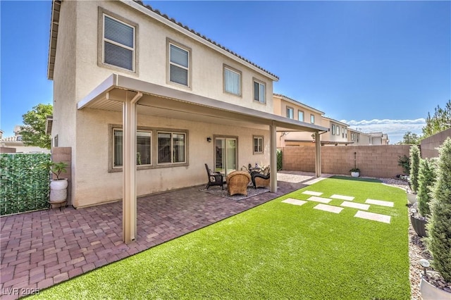 9113 Sea Mink Ave, Las Vegas, NV 89149 - rear view of property featuring stucco siding and a fenced backyard