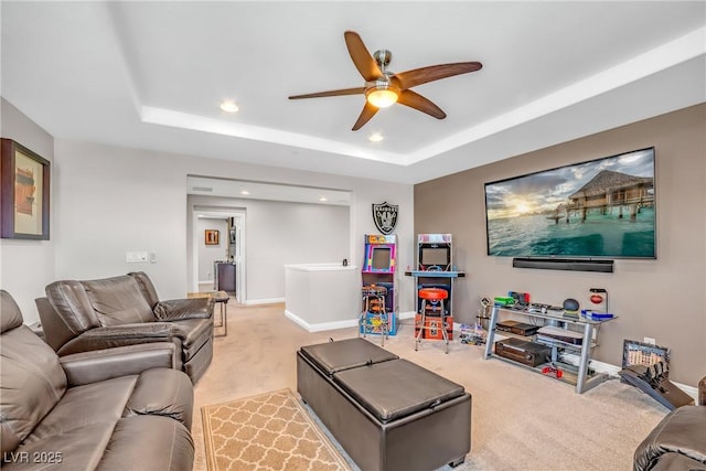 2154 Tortona St, Henderson, NV 89044 - living area featuring light carpet, a ceiling fan, recessed lighting, and a tray ceiling