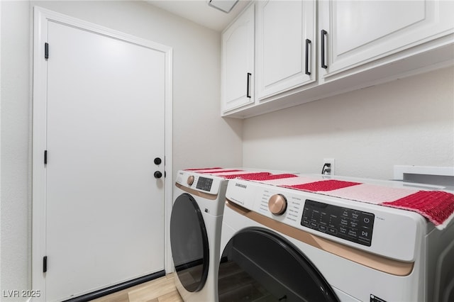 5570 Palm St, Las Vegas, NV 89120 - laundry room featuring cabinet space, independent washer and dryer, and light wood-style floors