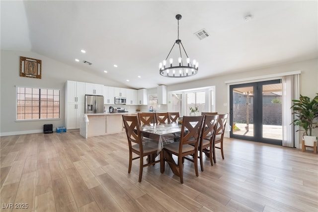 5570 Palm St, Las Vegas, NV 89120 - dining room with a chandelier, lofted ceiling, light wood-type flooring, and recessed lighting