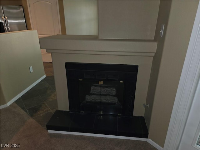 9000 Las Vegas Blvd Unit 2101, Las Vegas, NV 89123 - detailed view of a fireplace, stainless steel fridge with ice dispenser, and carpet
