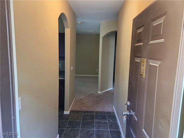 9000 Las Vegas Blvd Unit 2101, Las Vegas, NV 89123 - corridor featuring arched walkways and dark carpet