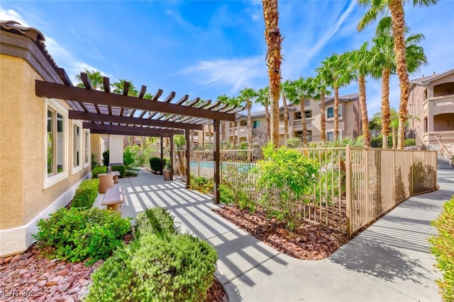 8805 Jeffreys St Unit 1048, Las Vegas, NV 89123 - view of yard with a pergola, a patio, and a residential view