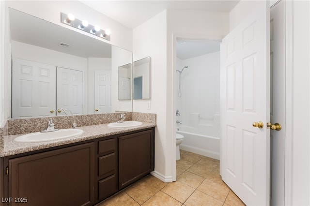 2400 Dutchmans Pipe Ct, Las Vegas, NV 89106 - bathroom with double vanity, tile patterned flooring, and washtub / shower combination