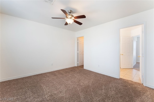 2400 Dutchmans Pipe Ct, Las Vegas, NV 89106 - unfurnished bedroom featuring light carpet and ceiling fan