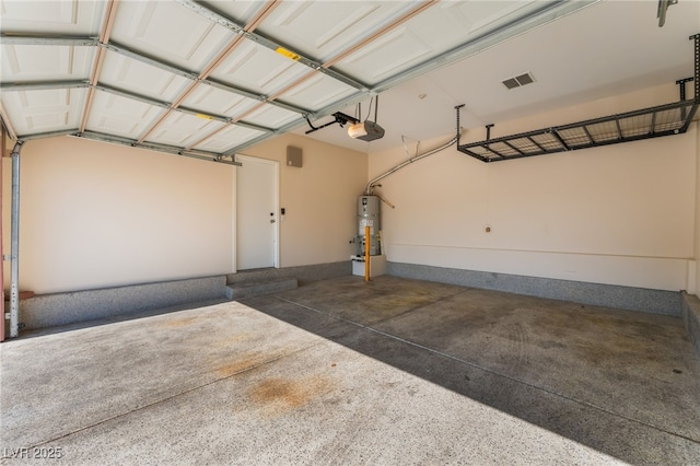 2400 Dutchmans Pipe Ct, Las Vegas, NV 89106 - garage with a garage door opener and water heater
