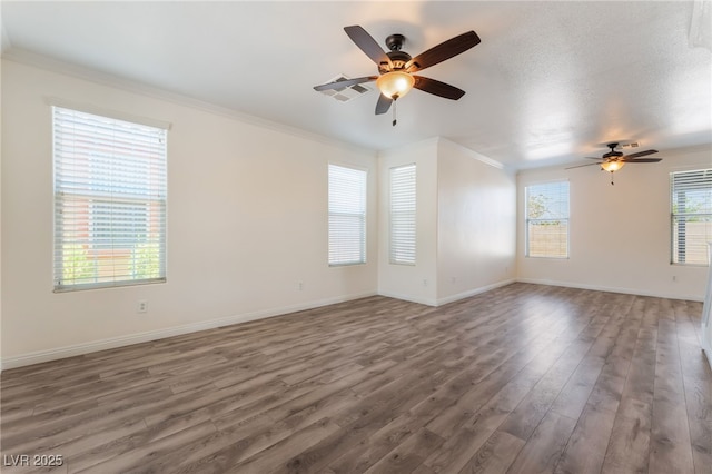 2400 Dutchmans Pipe Ct, Las Vegas, NV 89106 - unfurnished room with a ceiling fan, wood finished floors, and crown molding