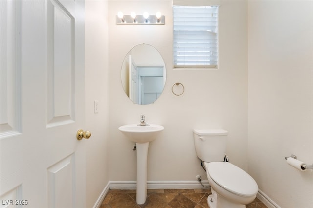 2400 Dutchmans Pipe Ct, Las Vegas, NV 89106 - half bathroom with toilet and baseboards