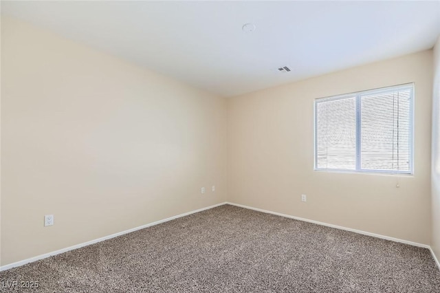 8842 Duncan Barrel Ave Unit 103, Las Vegas, NV 89178 - carpeted empty room with baseboards