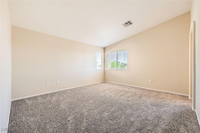 8842 Duncan Barrel Ave Unit 103, Las Vegas, NV 89178 - empty room with lofted ceiling and carpet