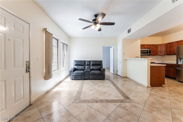 2141 Hussium Hills St Unit 108, Las Vegas, NV 89108 - living room featuring a ceiling fan and light tile patterned floors