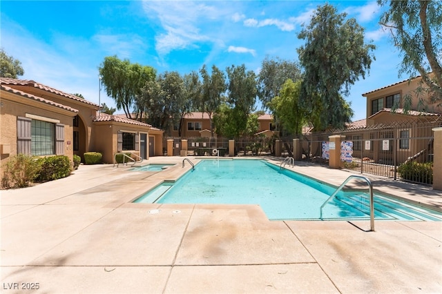 2141 Hussium Hills St Unit 108, Las Vegas, NV 89108 - community pool featuring a patio and a community hot tub