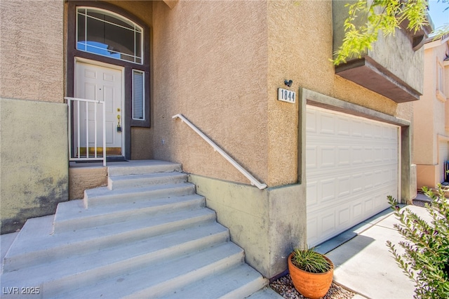 1844 Ghost Trace Ave, Las Vegas, NV 89183 - entrance to property with stucco siding and an attached garage