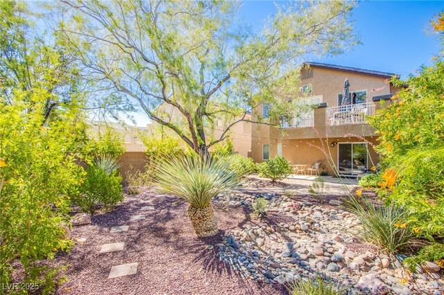 1844 Ghost Trace Ave, Las Vegas, NV 89183 - view of yard with a balcony and a patio area