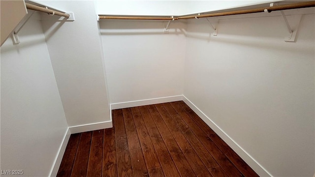 3930 Starfield Ln, Las Vegas, NV 89147 - spacious closet with dark wood-style floors