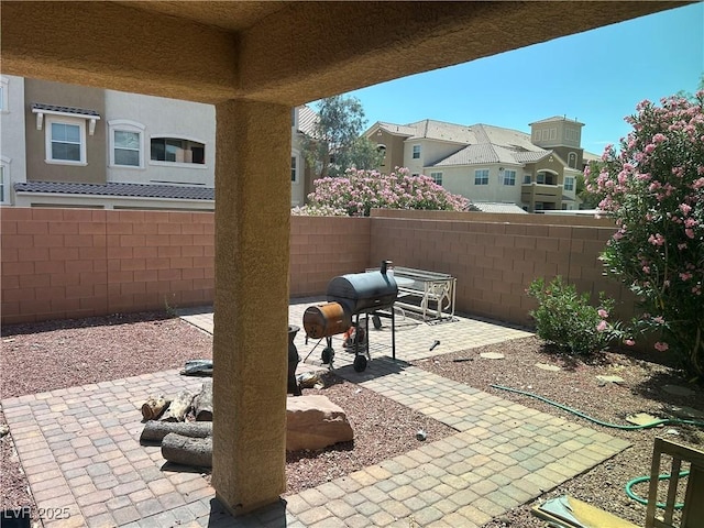 7064 Coventry Glenn Rd, Las Vegas, NV 89148 - view of patio with a grill and a residential view