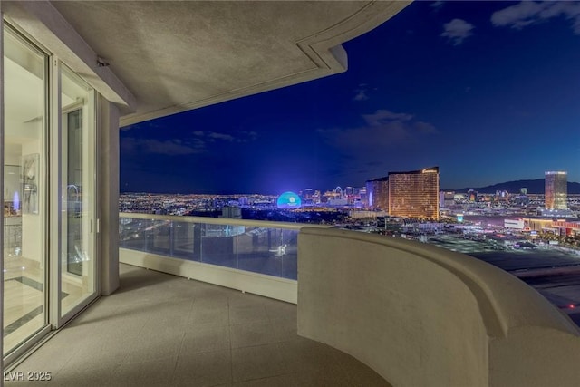 2877 Paradise Rd Unit 3202, Las Vegas, NV 89109 - balcony at twilight with a view of city lights
