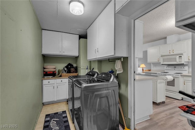 909 Biljac St, Las Vegas, NV 89145 - washroom with separate washer and dryer and light wood-style flooring