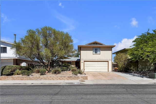 909 Biljac St, Las Vegas, NV 89145 - traditional home featuring an attached garage and concrete driveway