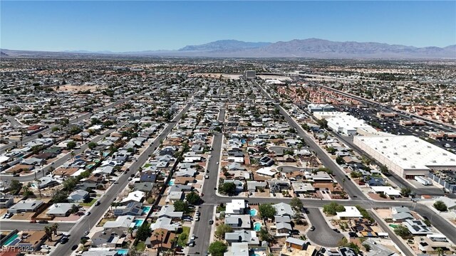 909 Biljac St, Las Vegas, NV 89145 - aerial view of property and surrounding area featuring a mountain backdrop and nearby suburban area