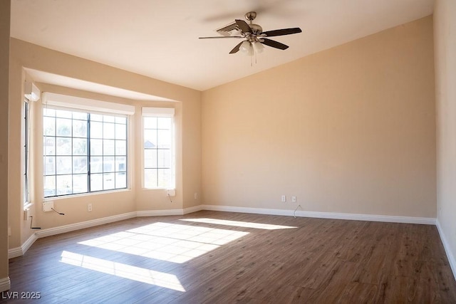 904 Swift Bear St, Henderson, NV 89002 - spare room featuring wood finished floors, a ceiling fan, and vaulted ceiling