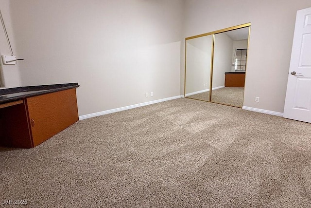904 Swift Bear St, Henderson, NV 89002 - unfurnished living room with carpet flooring and baseboards