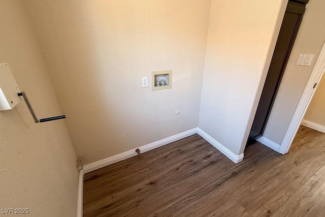 904 Swift Bear St, Henderson, NV 89002 - laundry area with gas dryer hookup, dark wood finished floors, and washer hookup