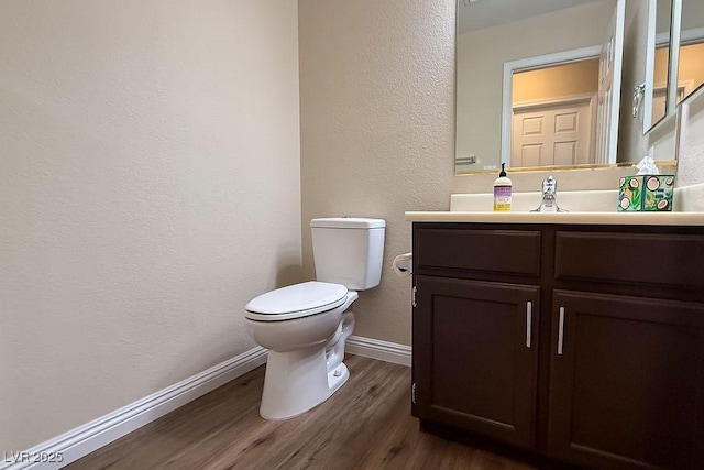 904 Swift Bear St, Henderson, NV 89002 - bathroom featuring wood finished floors, a textured wall, and vanity