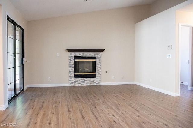 904 Swift Bear St, Henderson, NV 89002 - unfurnished living room featuring wood finished floors and a fireplace
