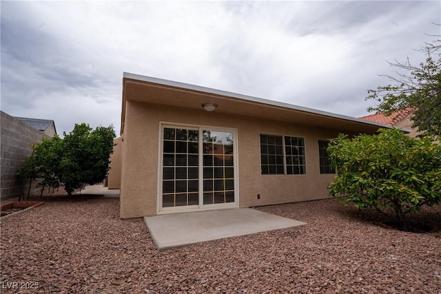 904 Swift Bear St, Henderson, NV 89002 - rear view of house featuring stucco siding and a patio