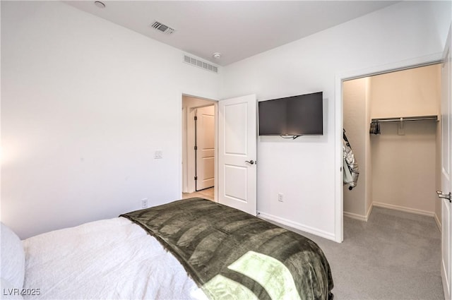 187 Palm Fox Ct, Henderson, NV 89011 - bedroom with light colored carpet, a spacious closet, and a closet