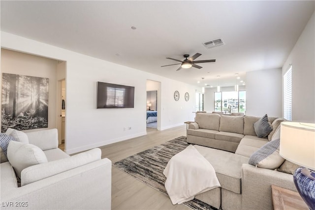 187 Palm Fox Ct, Henderson, NV 89011 - living area featuring a ceiling fan and light wood-style flooring