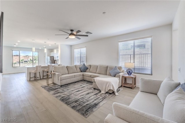 187 Palm Fox Ct, Henderson, NV 89011 - living area featuring light wood-style floors, ceiling fan, and recessed lighting