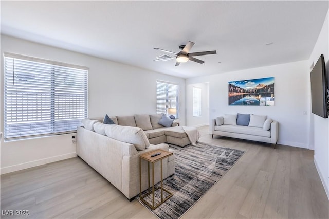 187 Palm Fox Ct, Henderson, NV 89011 - living area featuring light wood finished floors and ceiling fan