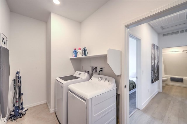187 Palm Fox Ct, Henderson, NV 89011 - laundry area featuring separate washer and dryer, recessed lighting, and water heater