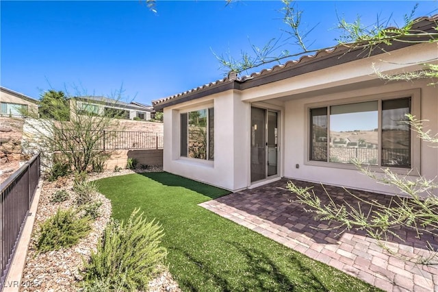 187 Palm Fox Ct, Henderson, NV 89011 - fenced backyard with a patio