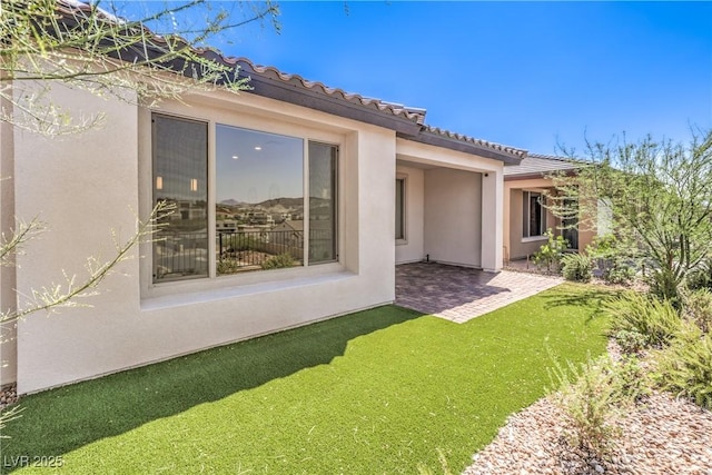 187 Palm Fox Ct, Henderson, NV 89011 - view of green lawn with a patio