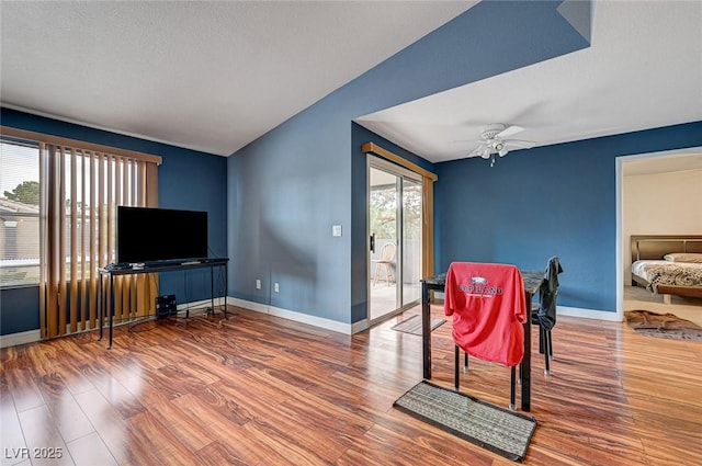 5055 W Hacienda Ave Unit 2003, Las Vegas, NV 89118 - dining space with wood finished floors and a ceiling fan