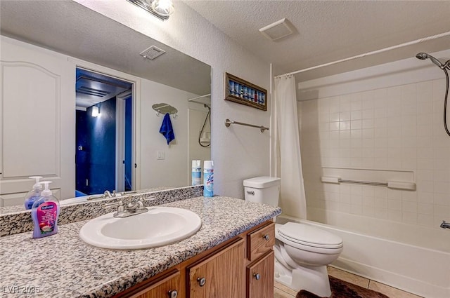 5055 W Hacienda Ave Unit 2003, Las Vegas, NV 89118 - full bathroom featuring vanity, shower / tub combo, tile patterned floors, and a textured ceiling