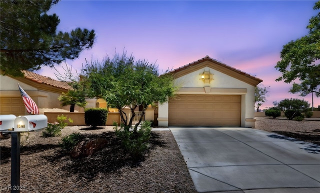 1900 Bellview St, Las Vegas, NV 89134 - view of front of property with concrete driveway, a garage, stucco siding, and a tiled roof